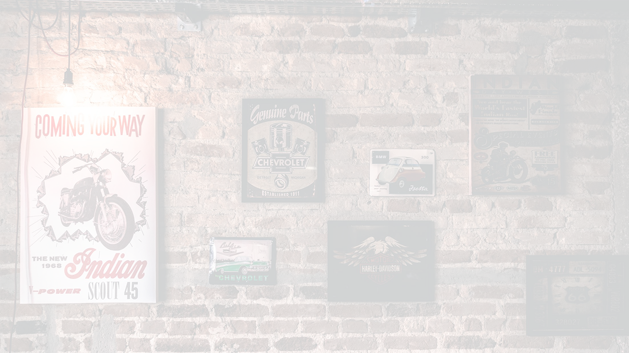 Darkened image of a brick gallery wall 