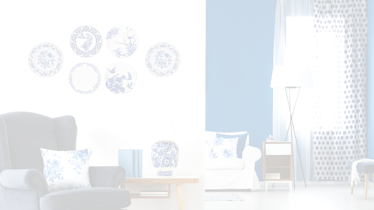 Darkened banner image of a living room with a plate wall
