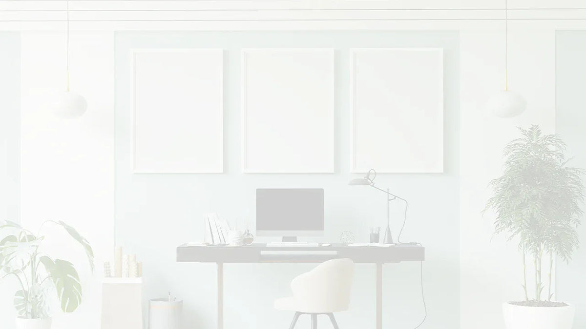 whitened image of an office with pictures on the wall