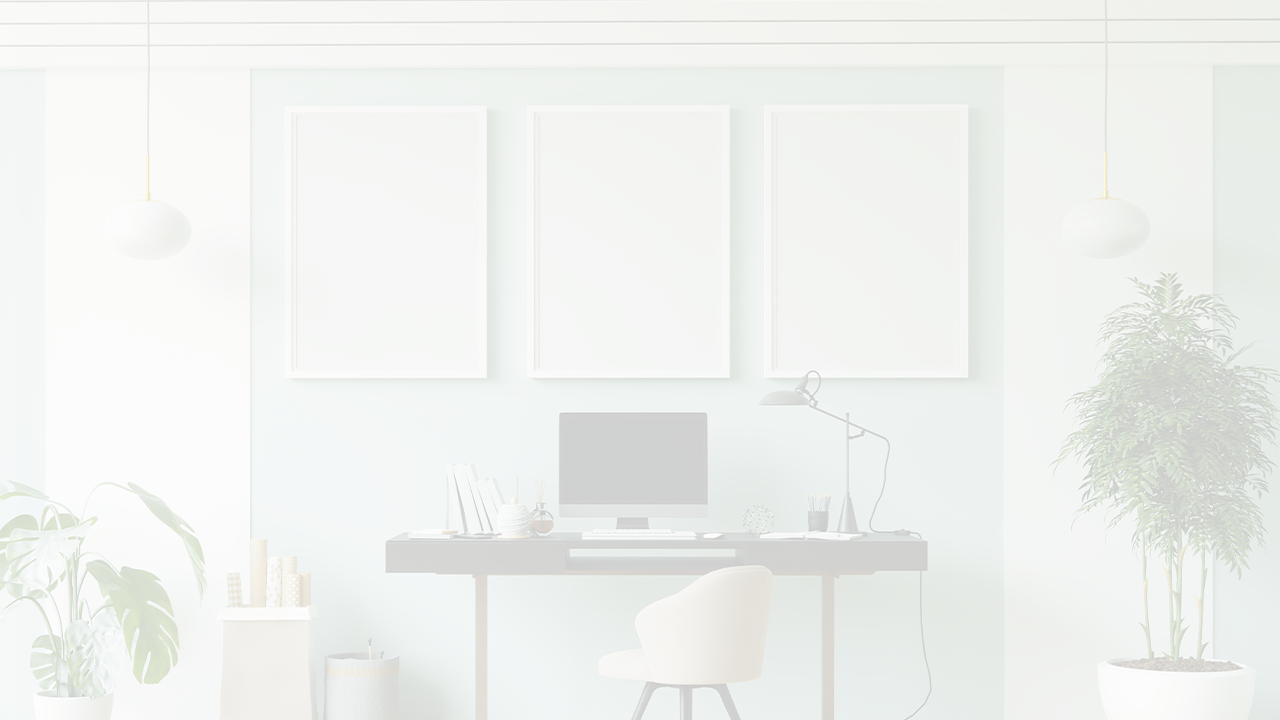 whitened image of an office with pictures on the wall