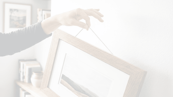 Why Your Picture Frame Keeps Going Crooked (And How to Actually Fix It) - Picture Hang Solutions
