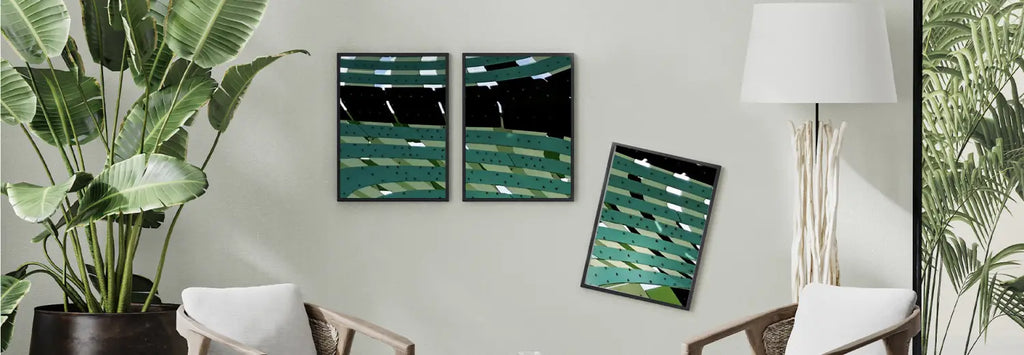 Three frames on the wall but one of them is falling