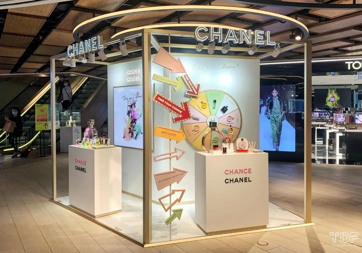 A pop-up booth by Chanel featuring perfume products