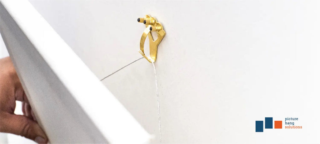 hanging canvas on a wall hook