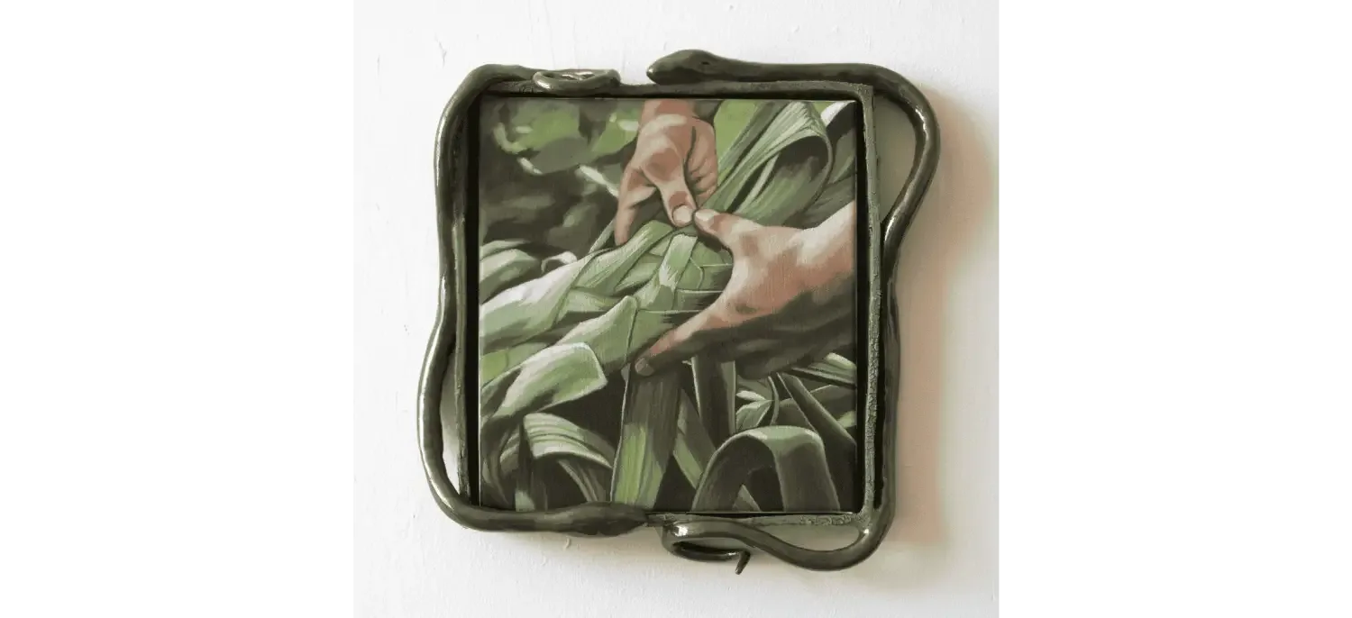 ceramic picture frame with snakes on the border