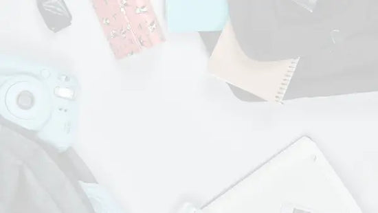 Darkened image of a person hanging art on the wall